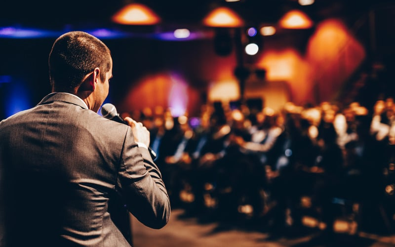 Speaker in front of audience